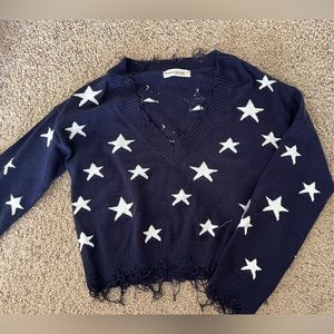 Boutique Distressed Off The Shoulder Star Sweater